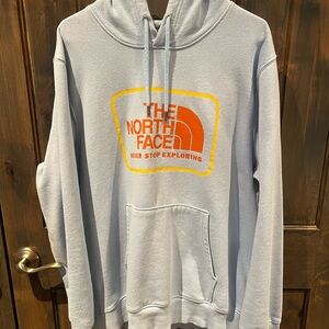 The North Face Men's Light Blue Hoodie with Orange Logo